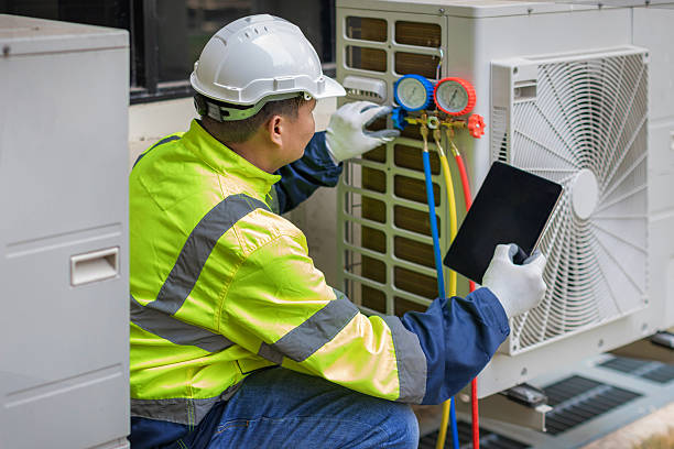 Professional Air Conditioning Repair technician working in Bath, ME